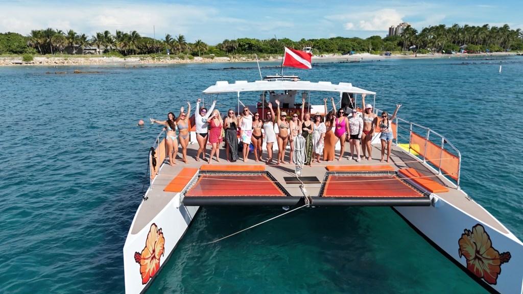 Aerial view of a catamaran anchored near Peanut Island